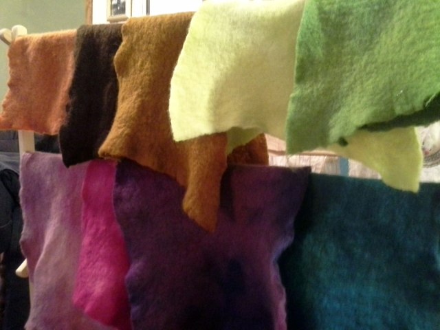 I'm so happy with my felt palette. I had so much fun dyeing these and they felted up even more in the dyepot. I used acid dyes and citric acid to set them. I just boiled each one individually and when the water was clear, I took the piece out and put the next one in